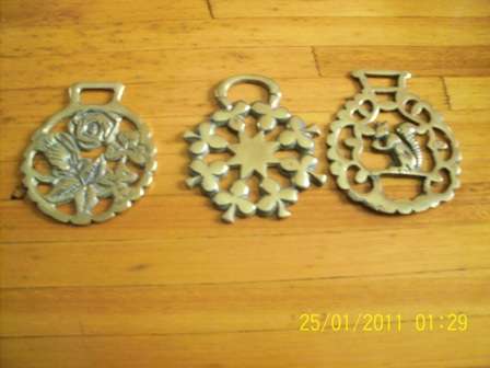 Three Brass Decorations