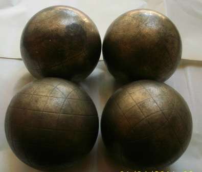 Four Shot Put Balls - Possibly Brass - Heavy (Shipping R80)