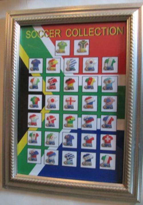 Framed Raised Emblems of World Soccer Team Uniforms