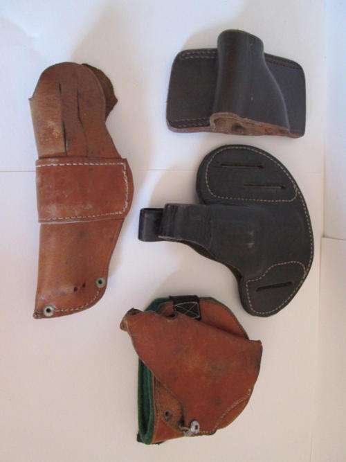 Four Old Leather Gun Holsters