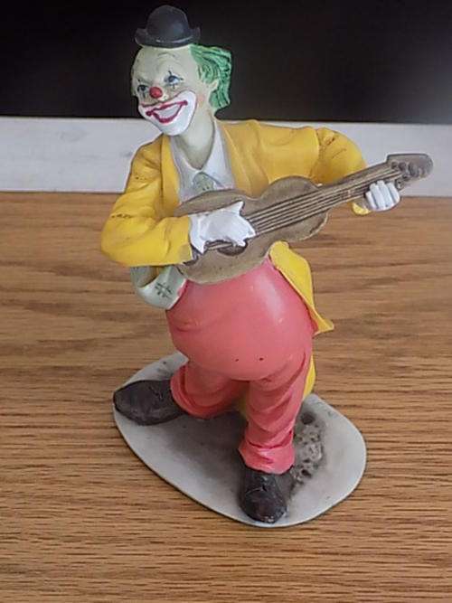 Old Clown Playing Musical Instrument Figurine with Felt Base