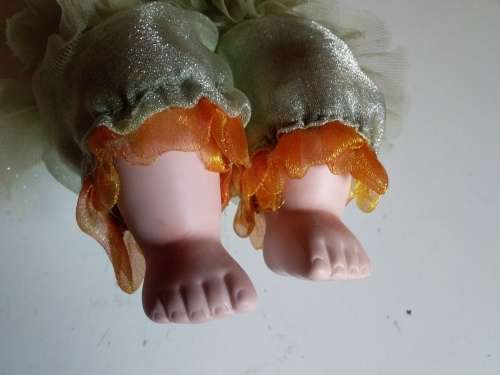 Ceramic doll with closed eyes