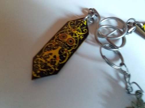 Two Wood and One Metal Key Ring Attachments