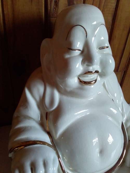 Vintage Ivory and Gold Glazed Ceramic Budha Figurine