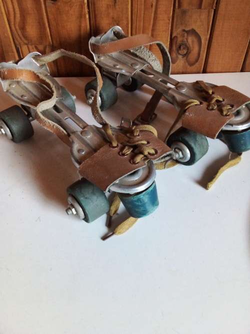 Vintage 1960`s Seiko Metal, leather and Rubber Rollerblades