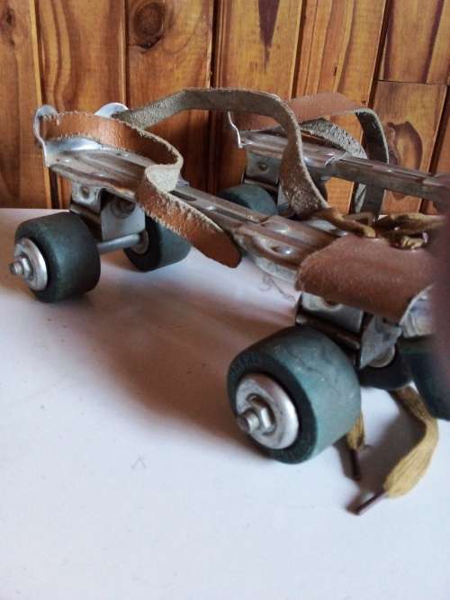Vintage 1960`s Seiko Metal, leather and Rubber Rollerblades