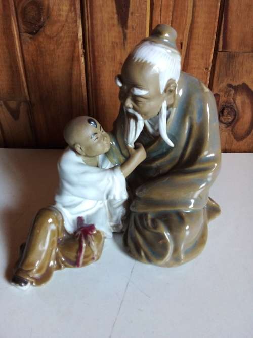 Vintage Partially Glazed Clay Oriental Figurine