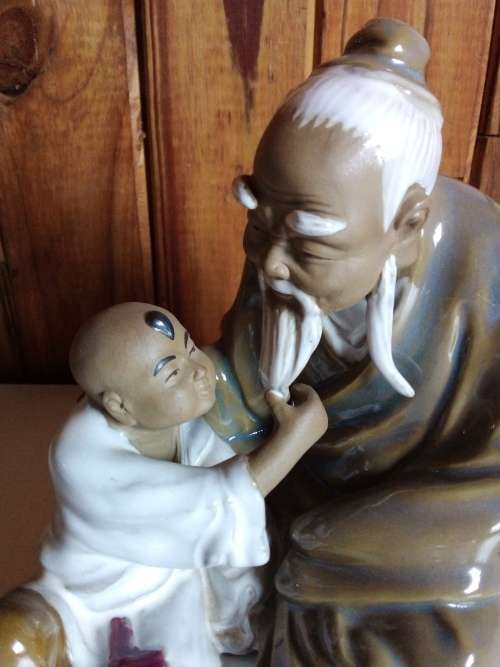 Vintage Partially Glazed Clay Oriental Figurine