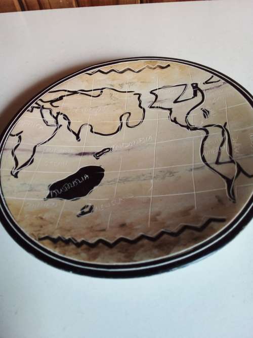 Stoneware Dish Showing Artistic Design ofWorld Map