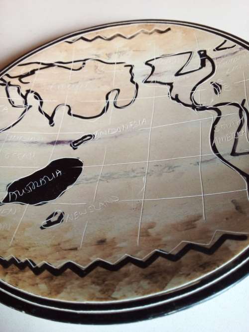 Stoneware Dish Showing Artistic Design ofWorld Map