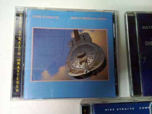 Three Dire Straits CDs for One Bid