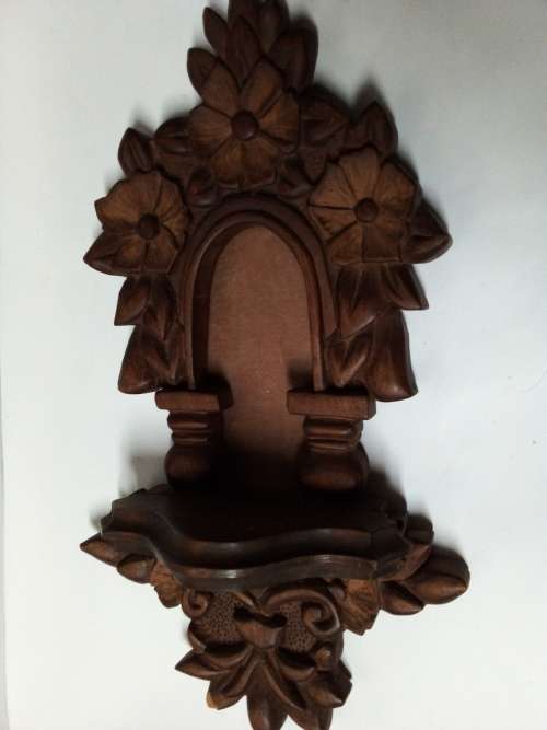 Decorative Carved Wooden Wall Hanging with Small Shelf