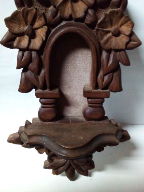 Decorative Carved Wooden Wall Hanging with Small Shelf