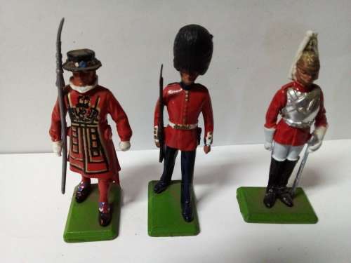 Three Small Die Cast British Figurines with Markings