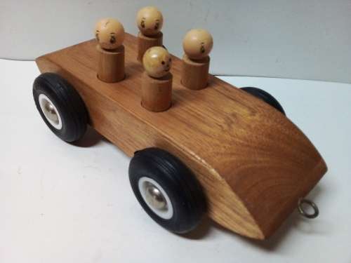 Solid Wood Ride Along Toy with Hard Plastic Wheels