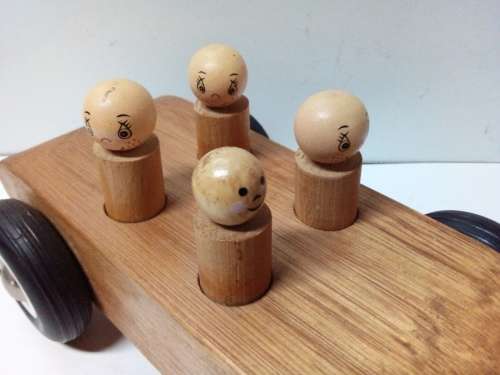 Solid Wood Ride Along Toy with Hard Plastic Wheels