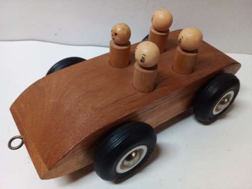 Solid Wood Ride Along Toy with Hard Plastic Wheels