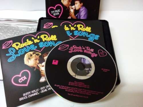 Tin with 3 cds. Rock n Roll Love Songs