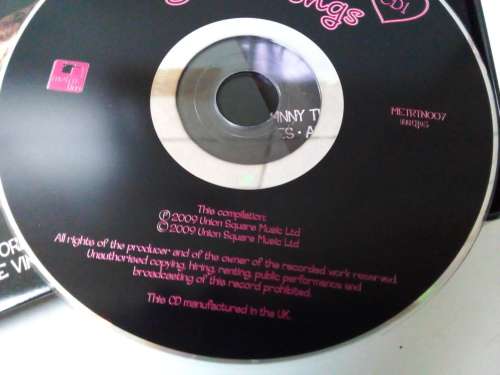 Tin with 3 cds. Rock n Roll Love Songs