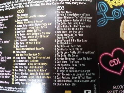 Tin with 3 cds. Rock n Roll Love Songs