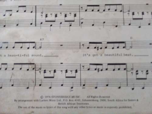 Two Old Music Sheets - Paul Simon and Neil Diamond