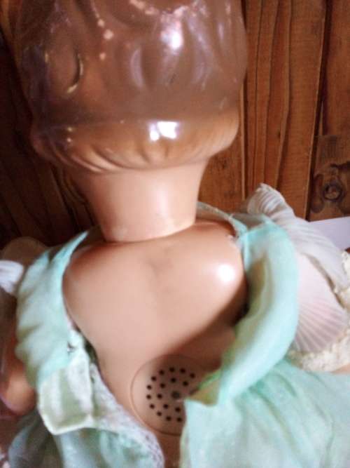 Old Vinyl Plastic Doll with Blue Eyes That Open and Close