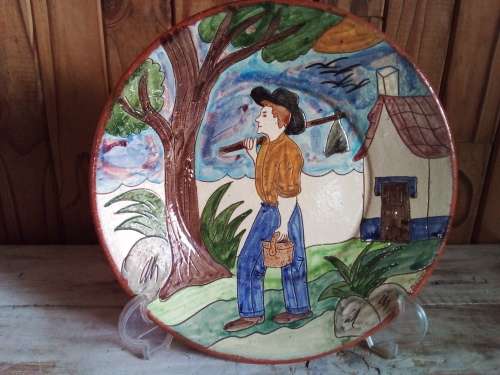 Art on Terracota  - Worker off to The Fields