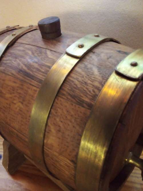 Vintage Wooden Cask with Tap on Stand