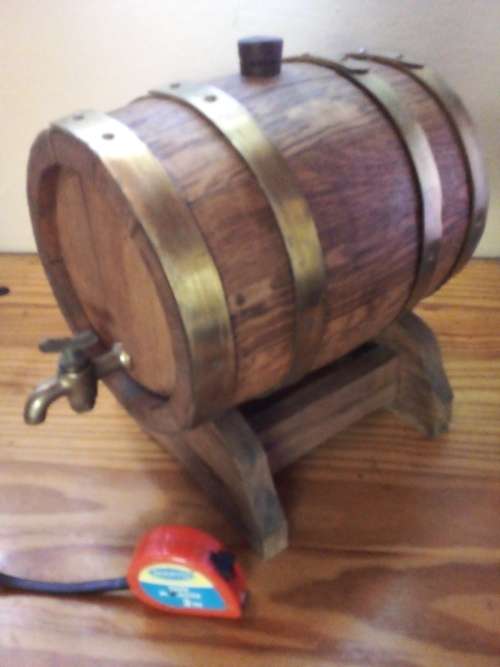Vintage Wooden Cask with Tap on Stand