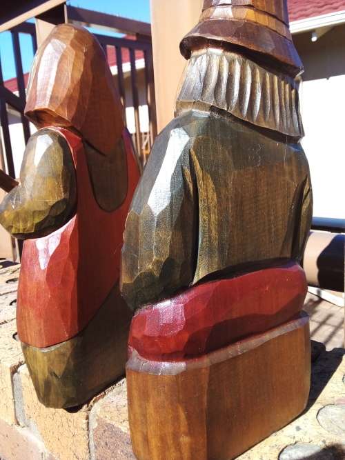 Pair of Solid Carved Wooden Figurines
