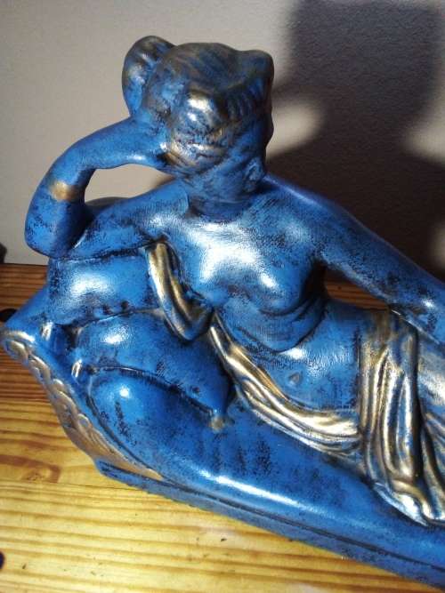 Ceramic Reclining Figurine on Chaise Lounger
