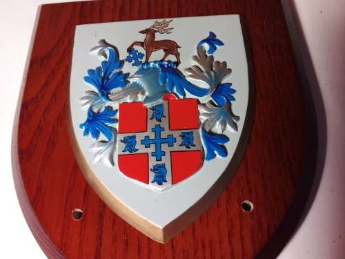 Plaque on wood.