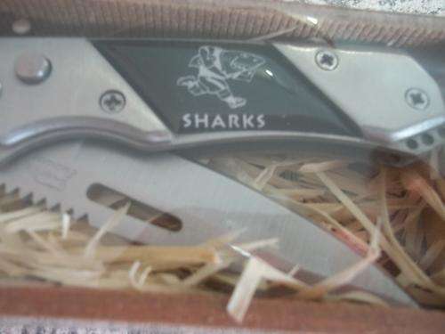 WOW (SHARKS  ) POCKET KNIFE  COLLECTION IN HOLDER RAP NOT USE