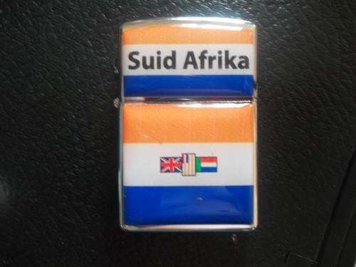 1 left WOW (Oranje Blanje Blou  ) lighter  Met Stem ONS VIR JOU SUID AFRIKA COLLECTION grap it now