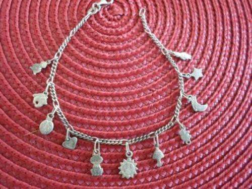 BEAUTIFUL!!! STERLING SILVER 11 CHARM BRACLET WITH THE SWEETEST CHARMS