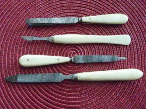 ANTIQUE BONE HANDLE MANICURE SET CIRCA 1900