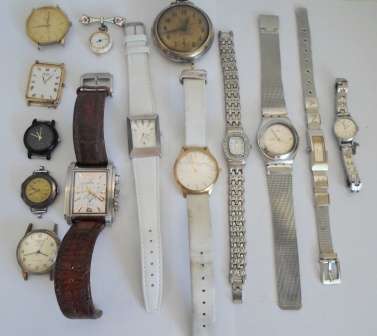 WOW!! COLLECTION OF VINTAGE AND NEWISH WATCHES 1 IS A STERLING SILVER AVIA WOW!!