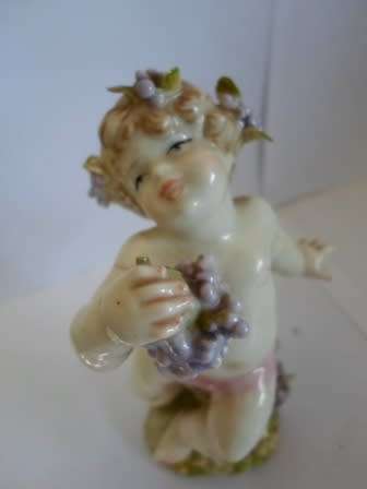 WOW!! VINTAGE HIGHLY DETAILED PORCELAIN FIGURE OF A CHILD STUNNING!! WOW!! WOW!!