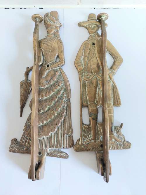 Gorgeous!! Large his and hers brass coat hangers Wow!!