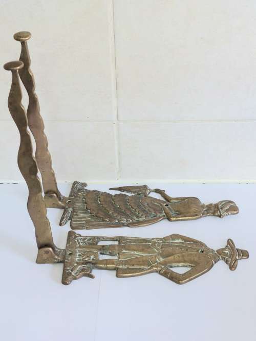Gorgeous!! Large his and hers brass coat hangers Wow!!