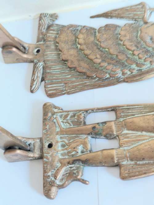 Gorgeous!! Large his and hers brass coat hangers Wow!!