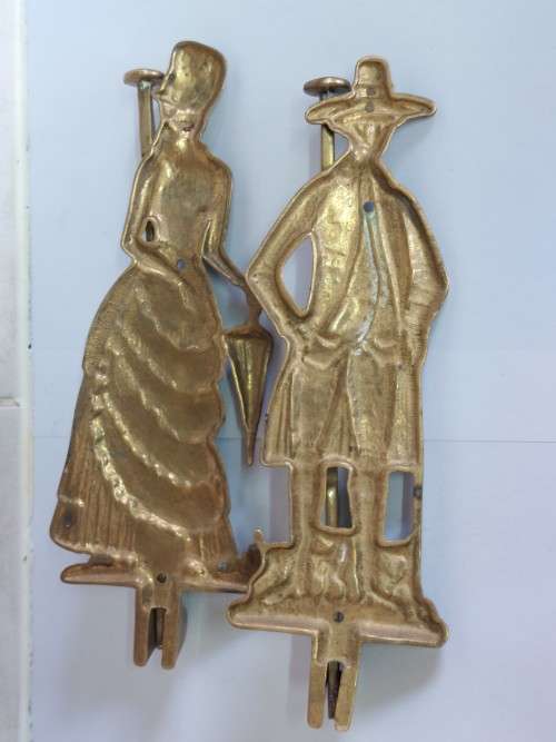 Gorgeous!! Large his and hers brass coat hangers Wow!!