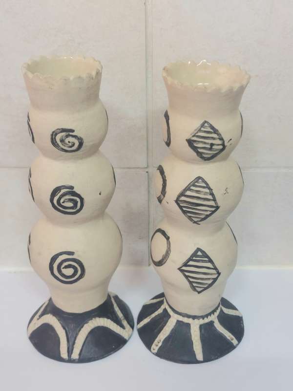 Rare!! Pair of Rorkes drift candle sticks signed E. Dommaan Value R1500