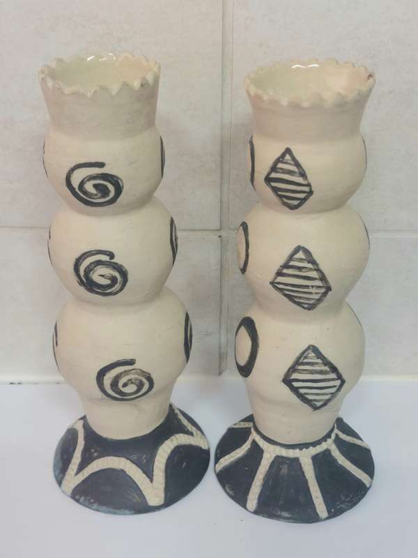 Rare!! Pair of Rorkes drift candle sticks signed E. Dommaan Value R1500