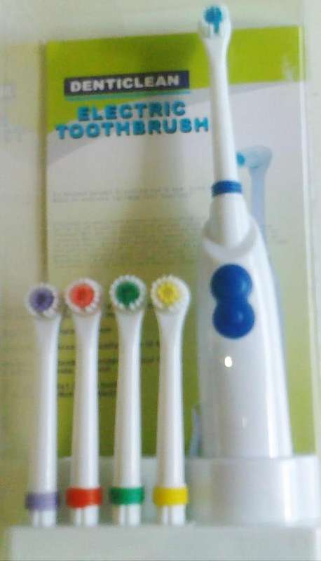 Electric Toothbrush (Denticlean) With 5 diffrent colour coded brush heads.