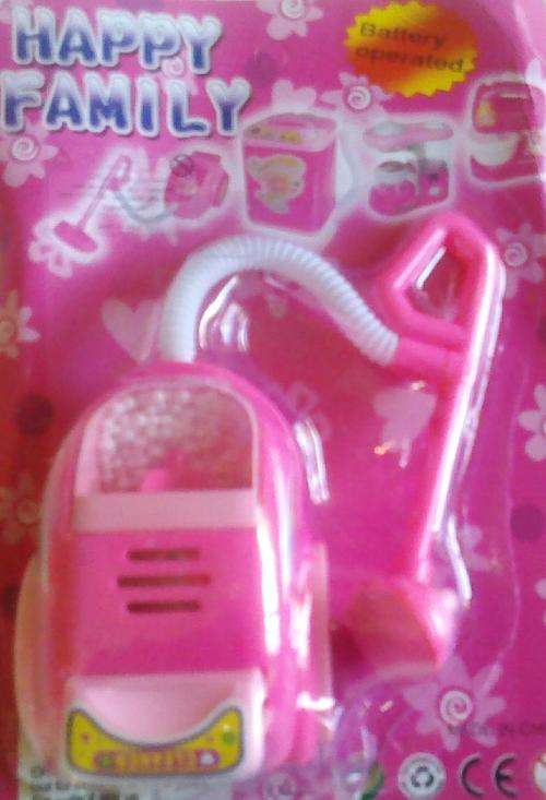 Battery operated little vacuum cleaner. Really cute!!! Collect them all!!!