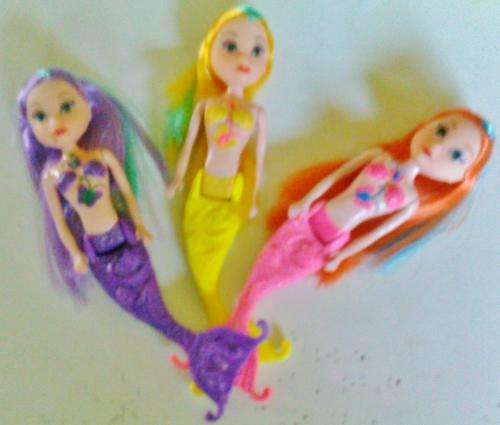 To cute, solid plastic Mermaid dolls, set of 3!! Arms, head and tail moves. Any little girls dream!