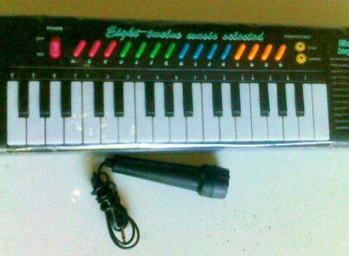 32Key Electronic Keyboard with MICROPHONE & external power supply.15min music selection & IC CIRCUIT