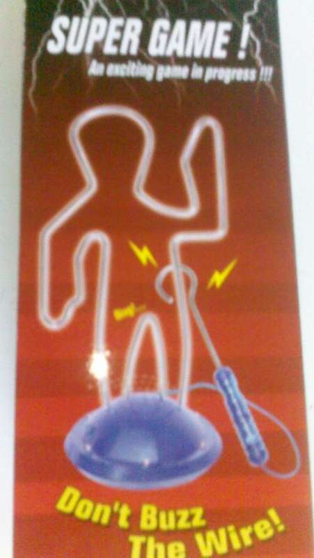 SUPER GAME !!!  Dont buzz the wire! An exciting game in progress. Perfect for eye hand co-ordination