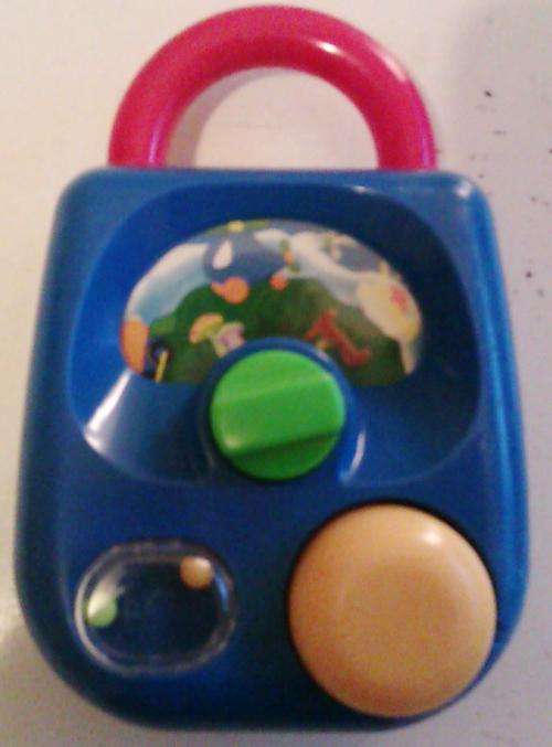 Cute little baby wind-up toy with music and bottons. Always a favorite!!